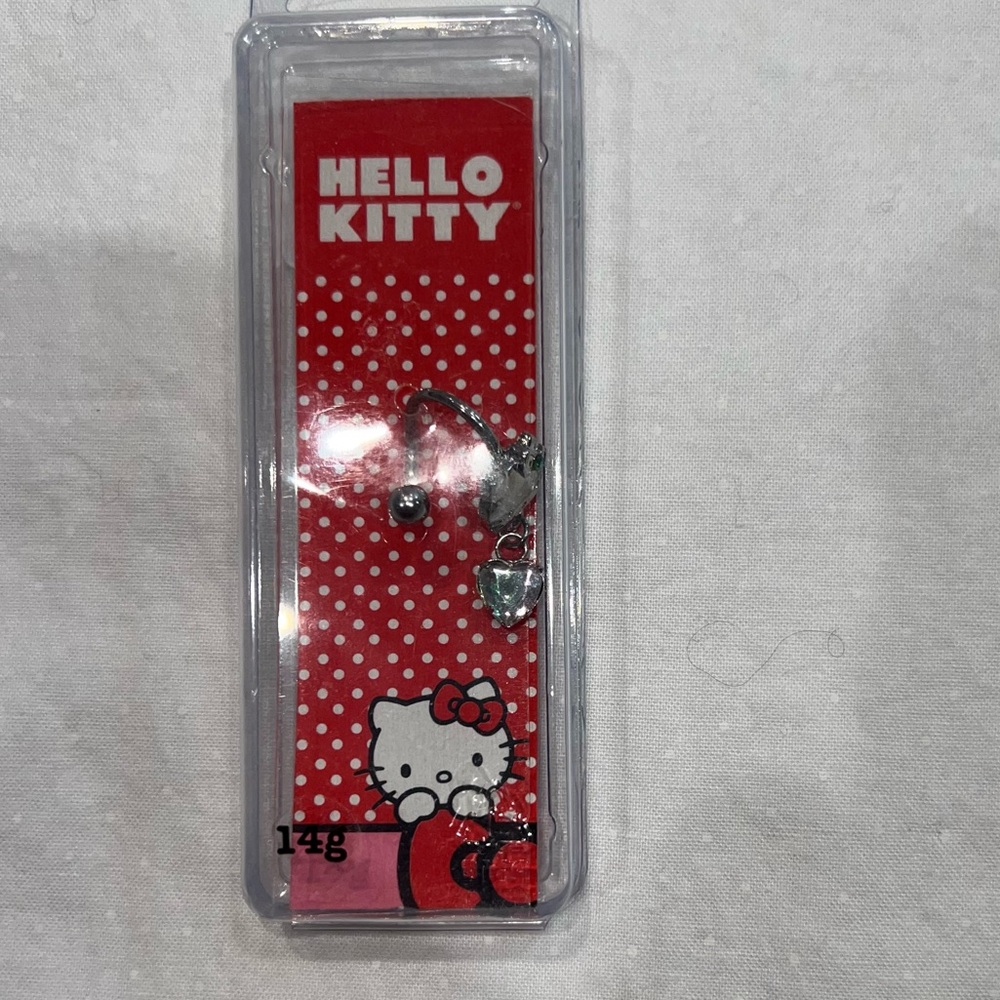 Hello Kitty Helix Ring. 14g. New in package. Bonus gift with purchase.